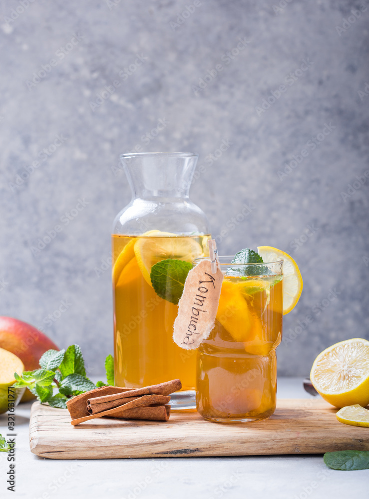 Fototapeta premium Healthy tea kombucha with lemon and cinnamon.