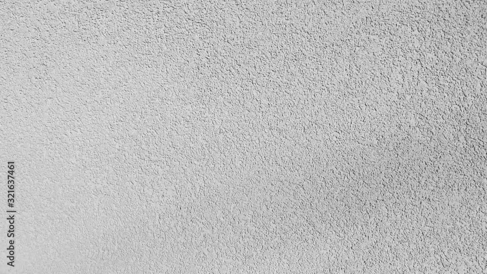 White background texture fast movement of the camera along the wall of plaster and white brick White background texture fast movement of the camera along the wall of plaster and white brick