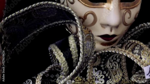 Close up of traditional Venetian mask and costume photo