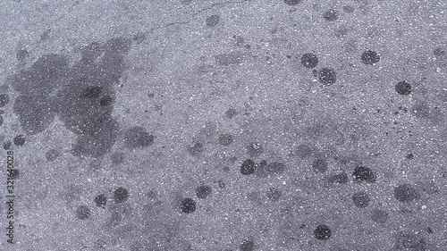 texture of oil stains on asphalt