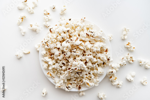 Spilled popcorn isolated on the white background.