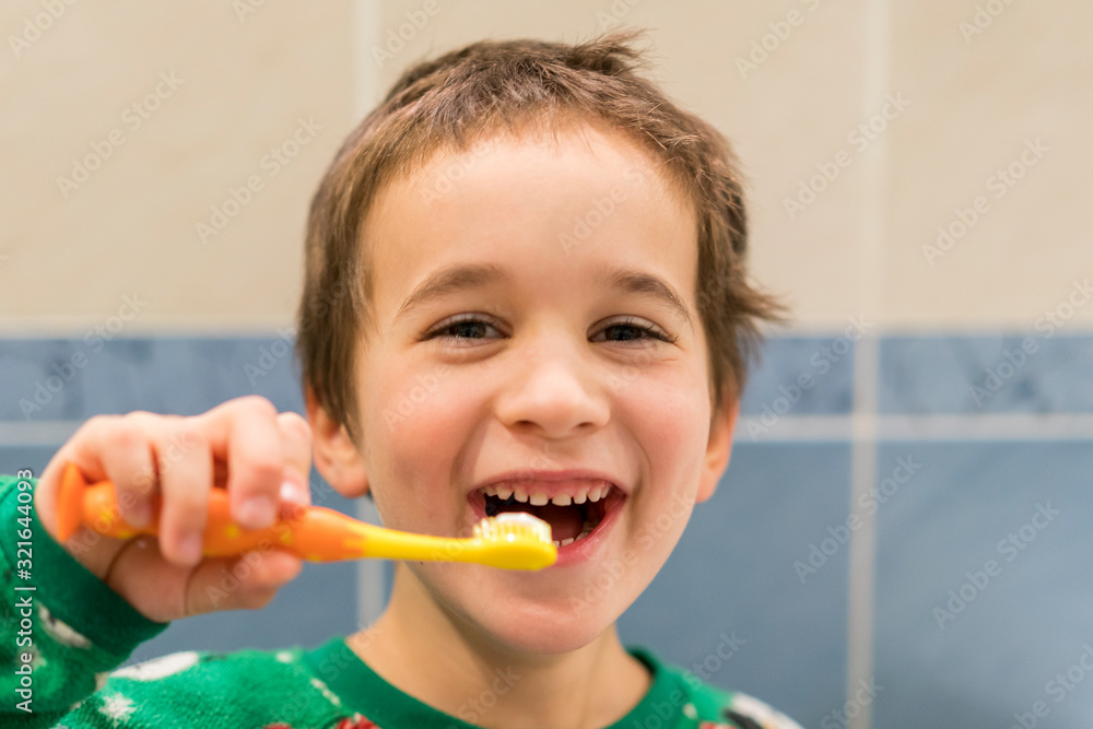 Happy little boy brushing his teeth. Oral hygiene concept. close up. Happy little boy brushing his teeth. Oral hygiene concept. close up.