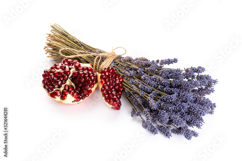 lavender spa products with pomegranate, lavender flowers on a isolated background.