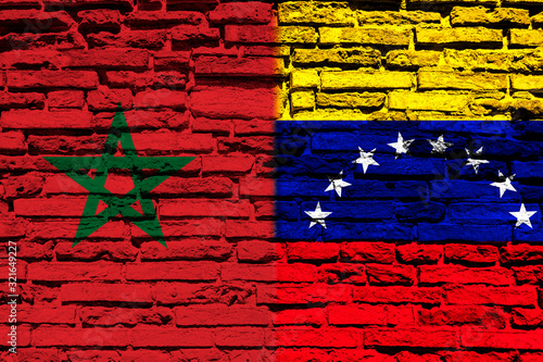 Flag of Morocco and Venezuela on brick wall