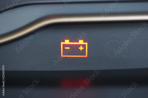 Vehicle battery warning symbol photo