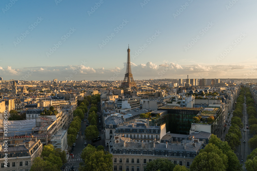 Aerial view of Paris City and the Eiffel Tower during the sunset