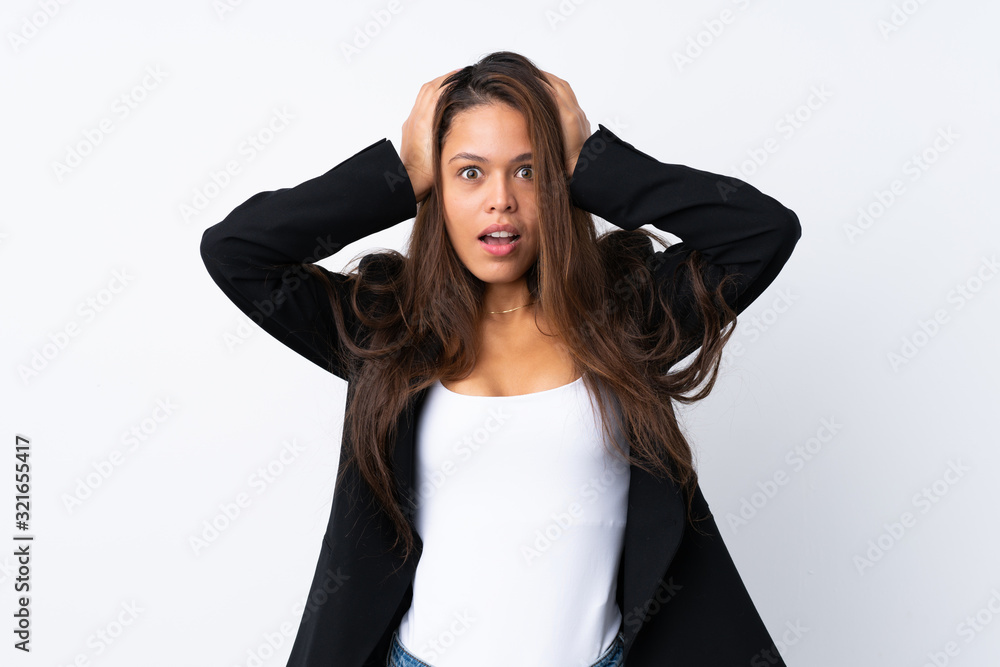 Young Brazilian girl with blazer over isolated white background with surprise facial expression Young Brazilian girl with blazer over isolated white background with surprise facial expression