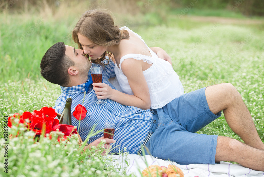 Fototapeta premium Young couple in the spring park