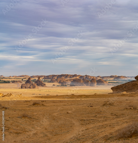 Geological rock strata (outcrops) at the ancient oasis ﻿﻿of Al Ula, Saudi Arabia photo