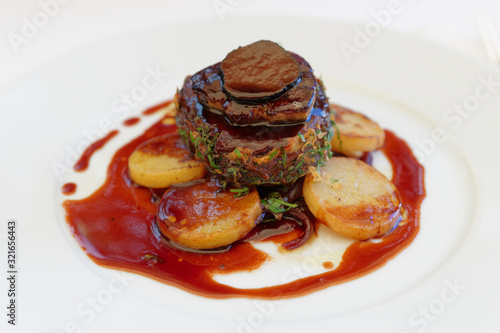 Beef steak with foie gras and truffles
