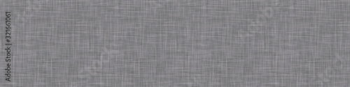 Natural anthracite gray french woven linen texture border background. Old raw flax fibre seamless banner pattern. Organic yarn close up weave fabric washi tape.  Grey fine canvas cloth effect edging.