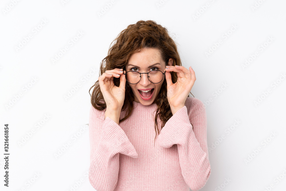 Young pretty woman over isolated background with glasses