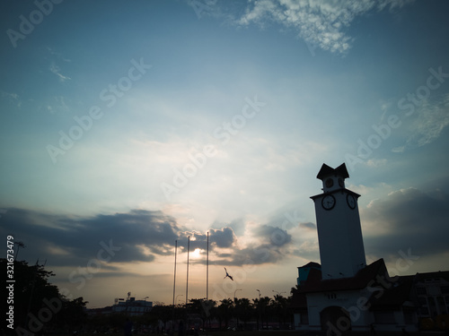 Sunset behind clouds in Negeri Sembilan, Malaysia. photo