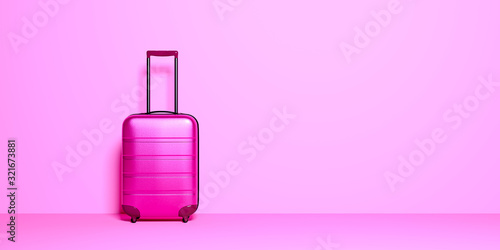 Suitcase on pastel background