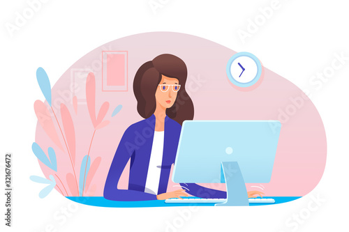 Young woman secretary working at office computer