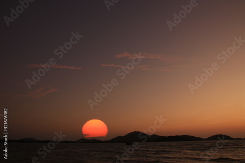 sunset over the sea © kaesunza