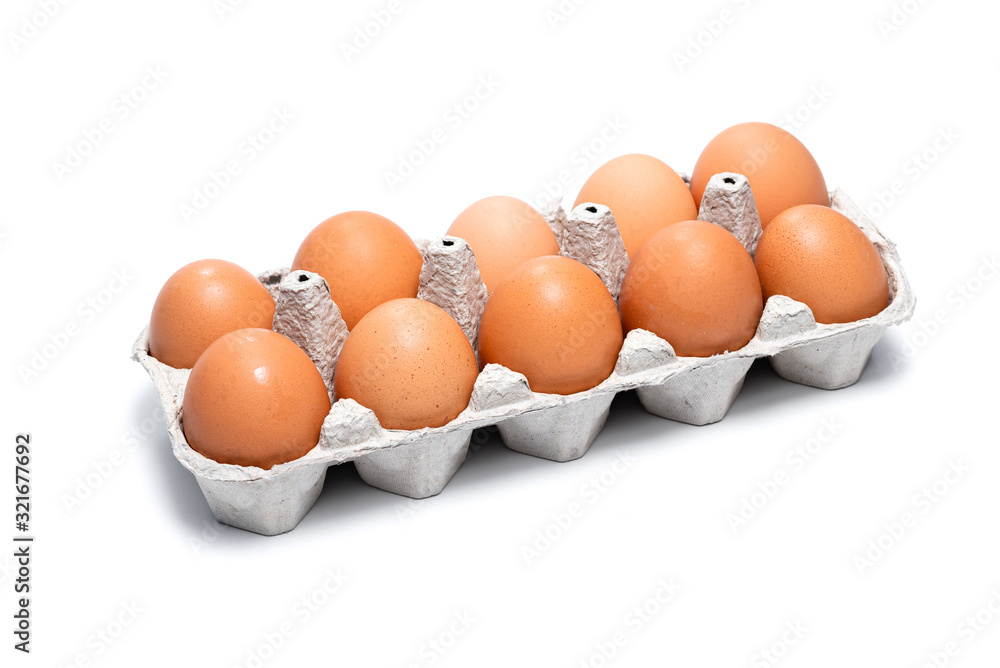 ten brown chicken eggs in a cardboard tray on a white background ten brown chicken eggs in a cardboard tray on a white background