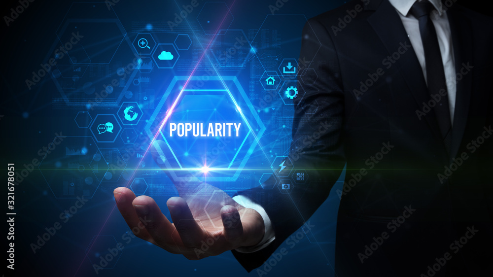 Man hand holding POPULARITY inscription, social media concept Man hand holding POPULARITY inscription, social media concept