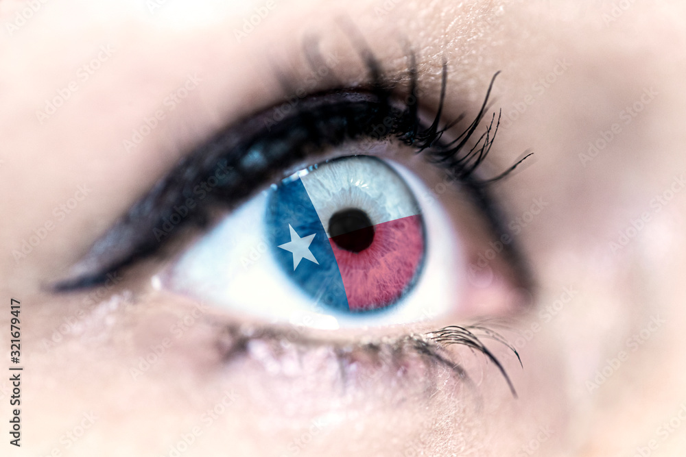 Obraz premium Flag of Texas state of the United States of America reflects in a woman blue eye - election, sport, hope, young, generation, american football, basket, emotion