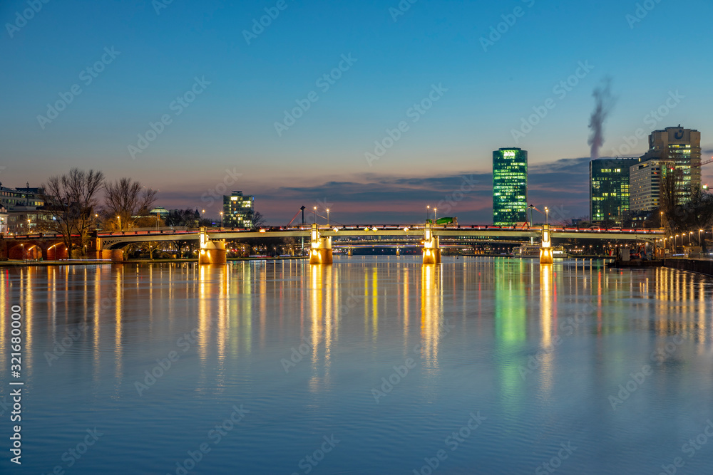 peace bridgecalled Friedensbruecke  in Frankfurt spanning river Main by night in Frankfurt,