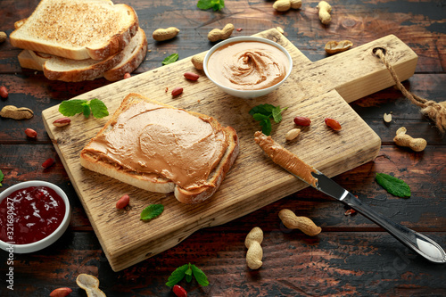 Peanut Butter Sandwich on wooden board. morning breakfast