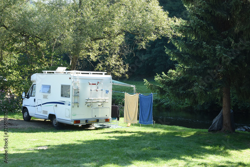 small campingcar on a campingsite at river Sure in Luxembourg