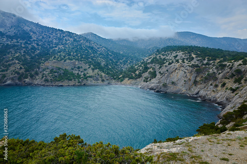 Blue Bay in the New World Botanical Reserve, the eastern coast of the Crimea Peninsula. Mountains by the Black Sea, view from Cape Kapchik.