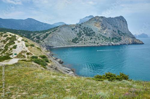 Obraz na płótnie Blue Bay in the New World Botanical Reserve, the eastern coast of the Crimea Peninsula. Mountains by the Black Sea, view from Cape Kapchik. w salonie