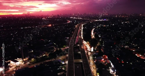 Becakayu toll road with exotic Jakarta skyline photo