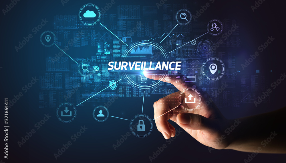 Hand touching SURVEILLANCE inscription, Cybersecurity concept Hand touching SURVEILLANCE inscription, Cybersecurity concept