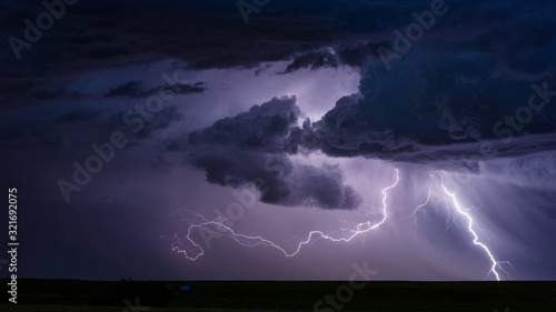 Lightning strike from a thunderstorm photo