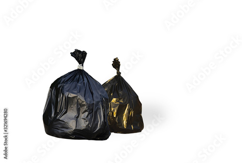 Two trash bags Close up of a garbage bag isolated on white background with clipping path. © TawanSaklay