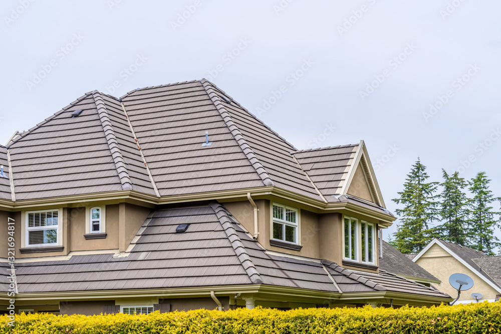 The top of the house or apartment building with nice window. The top of the house or apartment building with nice window.
