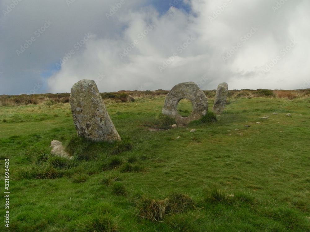 Men-an-Tol, Penwith Cornwall, winter 2009, . Between the village of Morvar and Madron is Mên-an-Tol  a small set of standing stones and a holed stone, thought to be Neolithic or early Bronze Age.