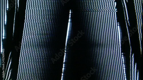 Analog retro style visuals with brightness variations, symetrical pattern and fast moving detailed pattern.