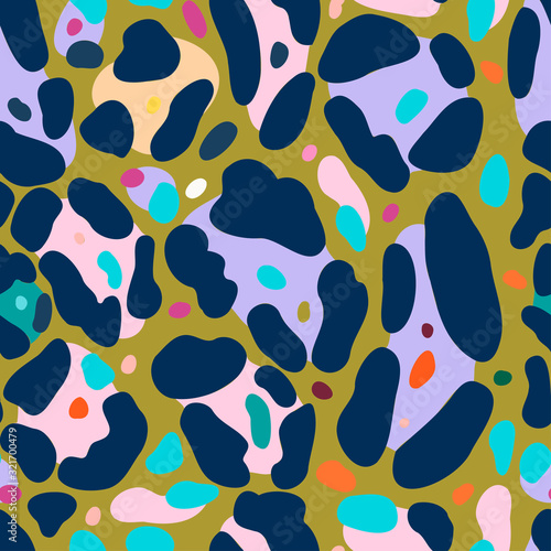 Modern seamless stylized design with jaguar skin in acidic colours. Can be used for printing on paper, stickers, badges, bijouterie, cards, textiles. 