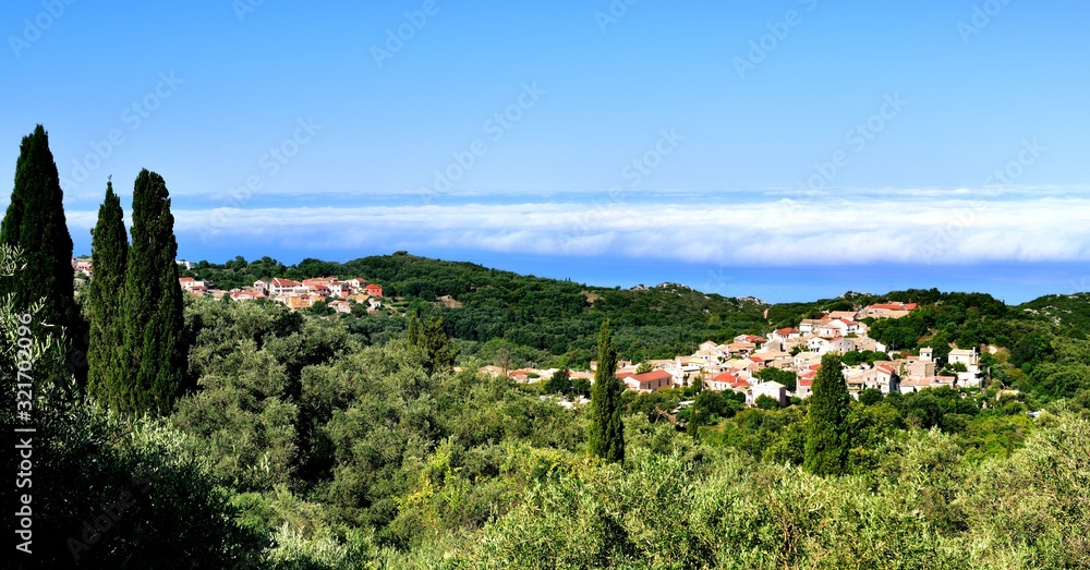 Corfu village and morning mist