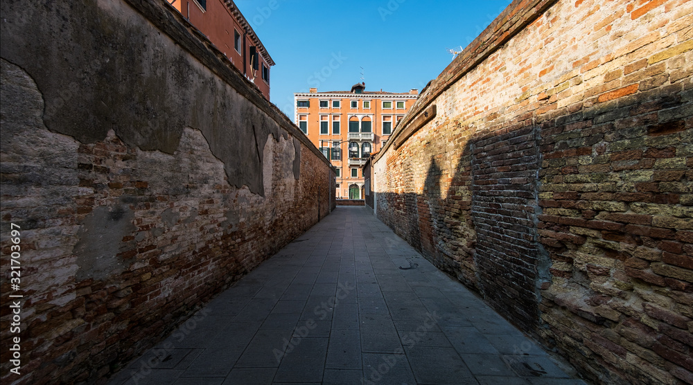 Alleys of the old city of Venice. The beauty of the ancient city. Italy