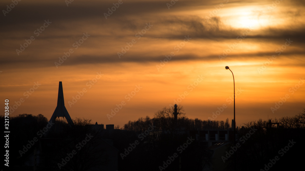 Obraz premium View of cityscape of Mulhouse in France by sunset