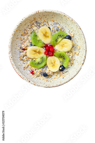 oatmeal, delicious and healthy breakfast, fresh fruits and berries (portion healthy food) menu concept. background. top view. copy space