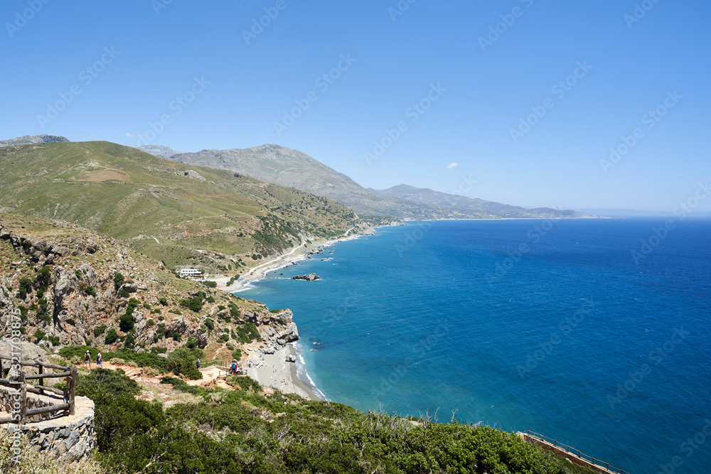 Panorama of Preveli beach at Libyan sea, river and palm forest, southern Crete , Greece.