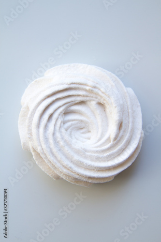 Homemade sweet delicious apple zefir (zephir, zephyr) on a white background, close up