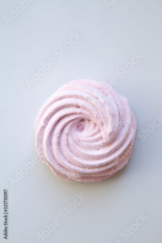 Homemade sweet delicious apple zefir (zephir, zephyr) on a white background, close up