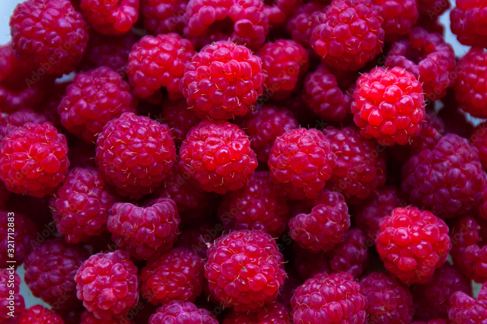 Fresh and sweet red raspberries background Fresh and sweet red raspberries background