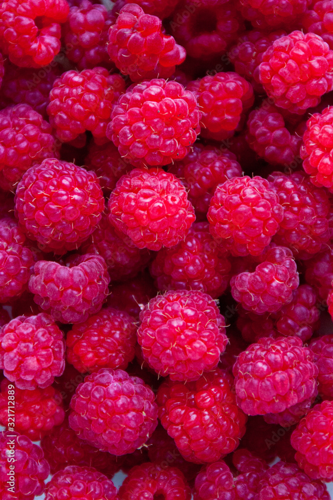 Fresh and sweet red raspberries background Fresh and sweet red raspberries background