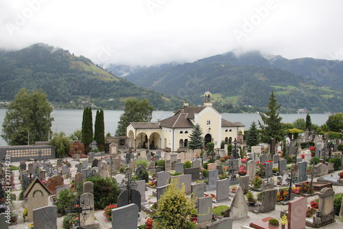 church and cemetery over mountain lake