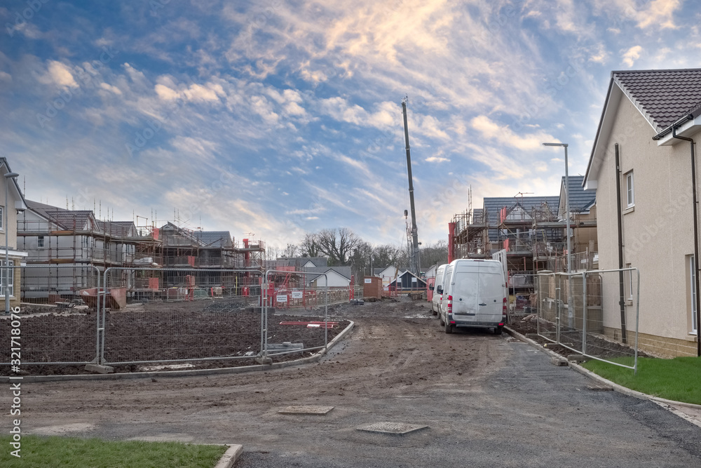 New Residential  Homes Under Construction on Scottish Building Site in Winter.