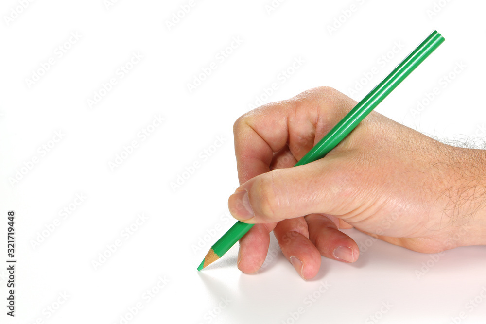 hand writing on a white sheet of paper with a green pencil hand writing on a white sheet of paper with a green pencil