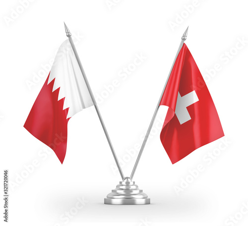 Switzerland and Bahrain table flags isolated on white 3D rendering photo