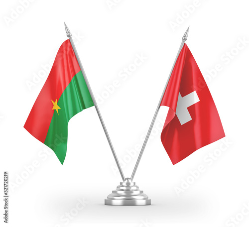 Switzerland and Burkina Faso table flags isolated on white 3D rendering photo